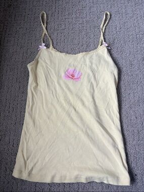 Yellow flower tank top with pink bows on straps